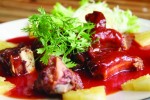 Roasted duck in red sauce