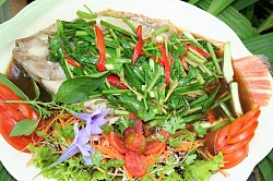 Steamed river fish in soy sauce